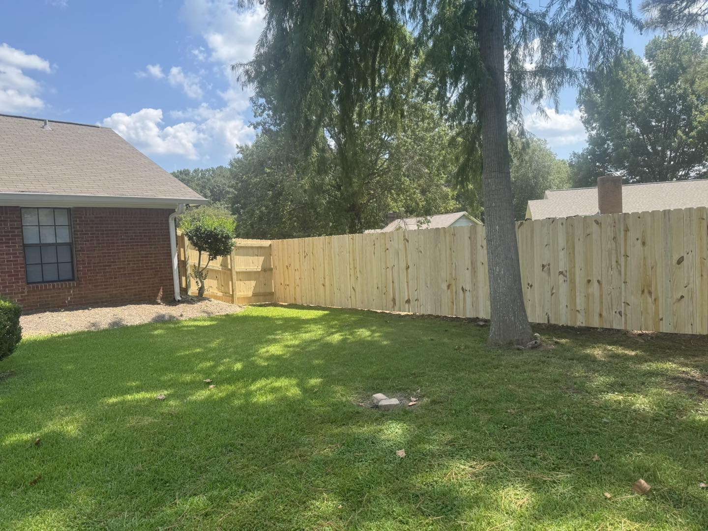 Wood fence repair on storm-damaged panel - fence repair service in Starkville, Mississippi